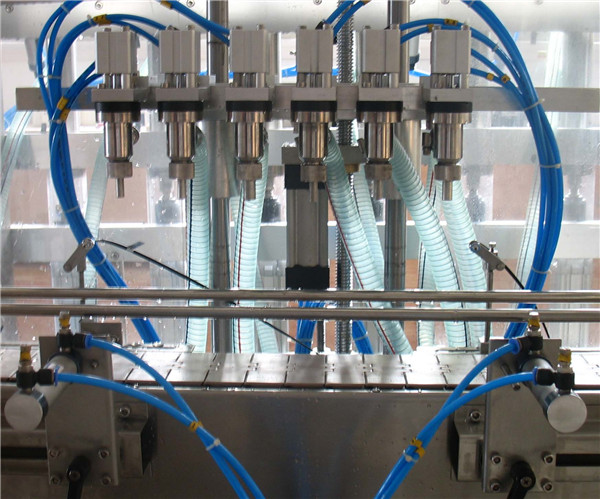 Máquina automática de llenado de líquidos de seis cabezales