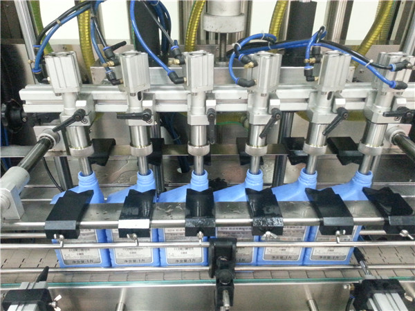 Máquina automática de llenado de aceite de motor de 6 cabezales