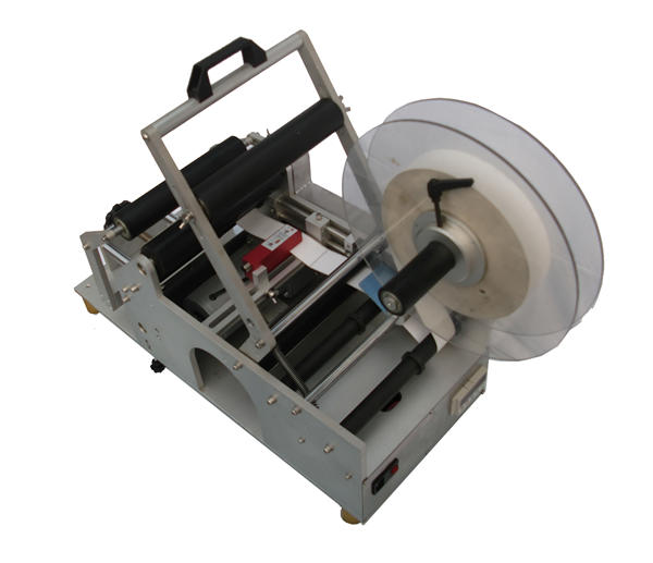 Máquina de etiquetado semiautomático de botellas de fábrica